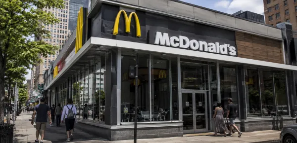 What drove McDonald's stock to a fresh 52-week low today?